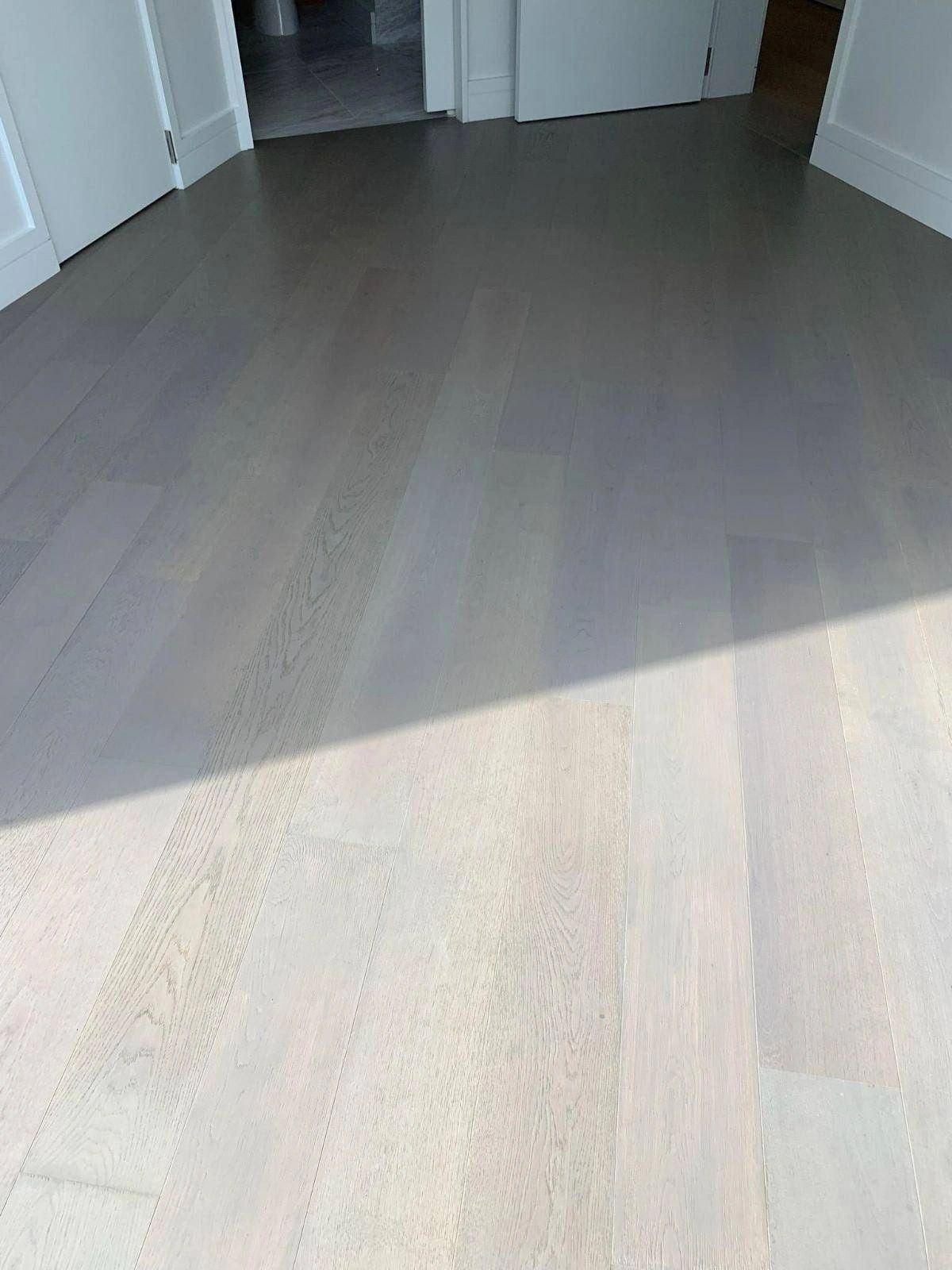 Light wood plank flooring hallway